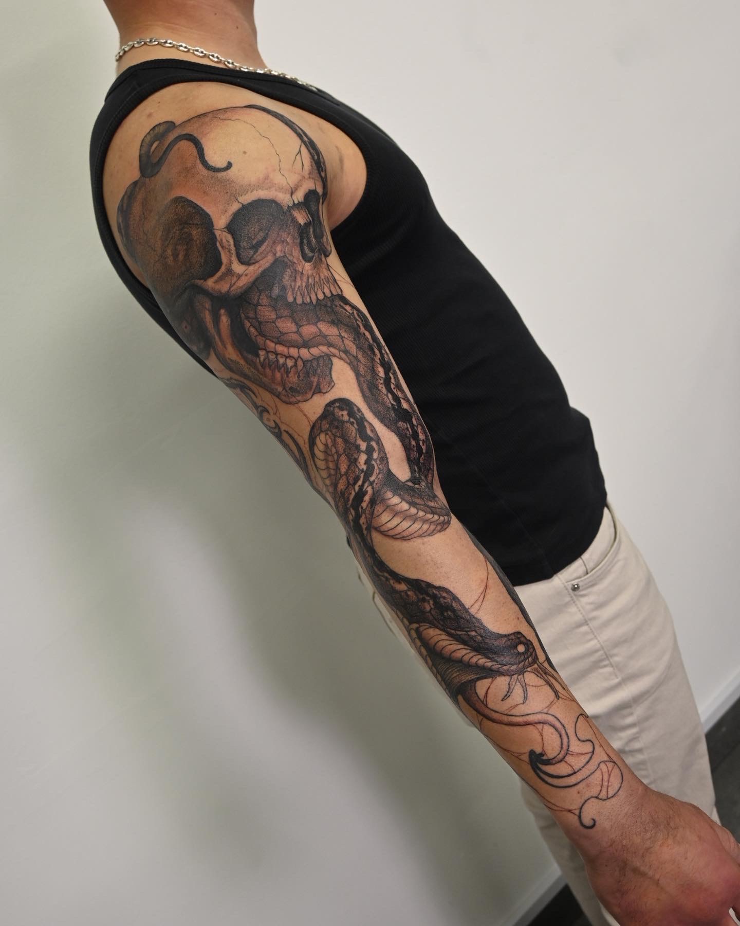 Crâne et serpent tattoo