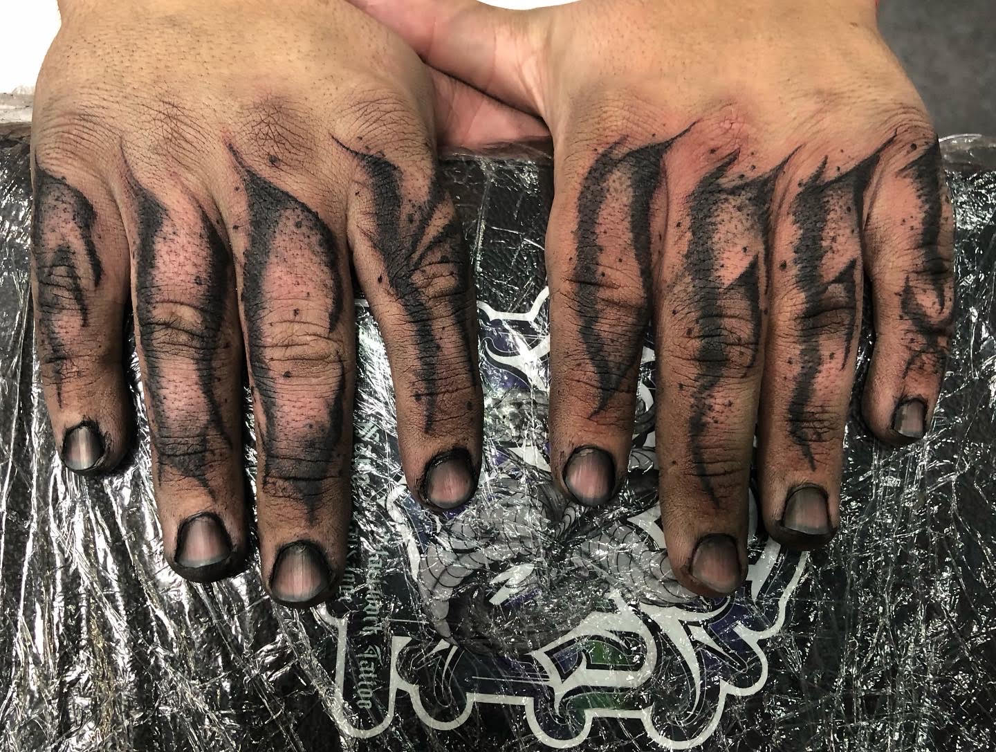 Fingers tattoo