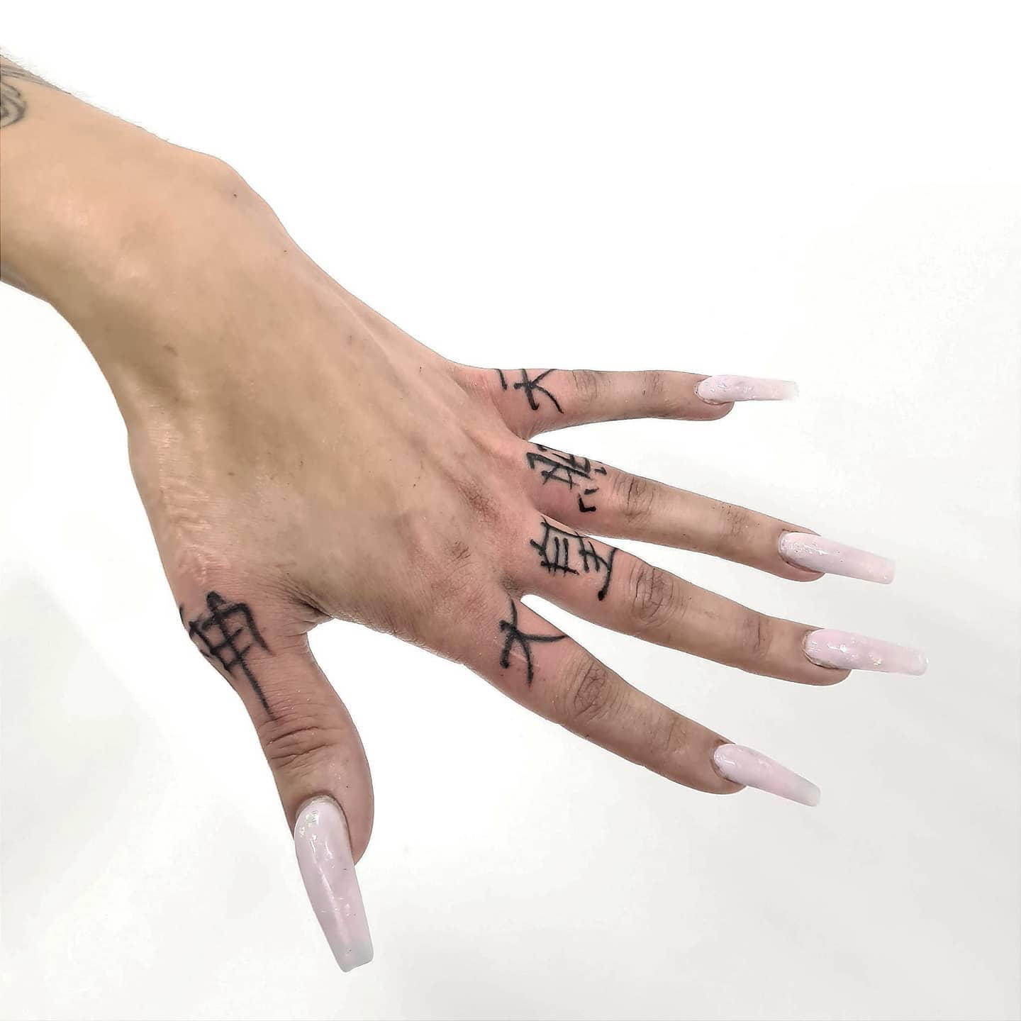 Fingers tattoo